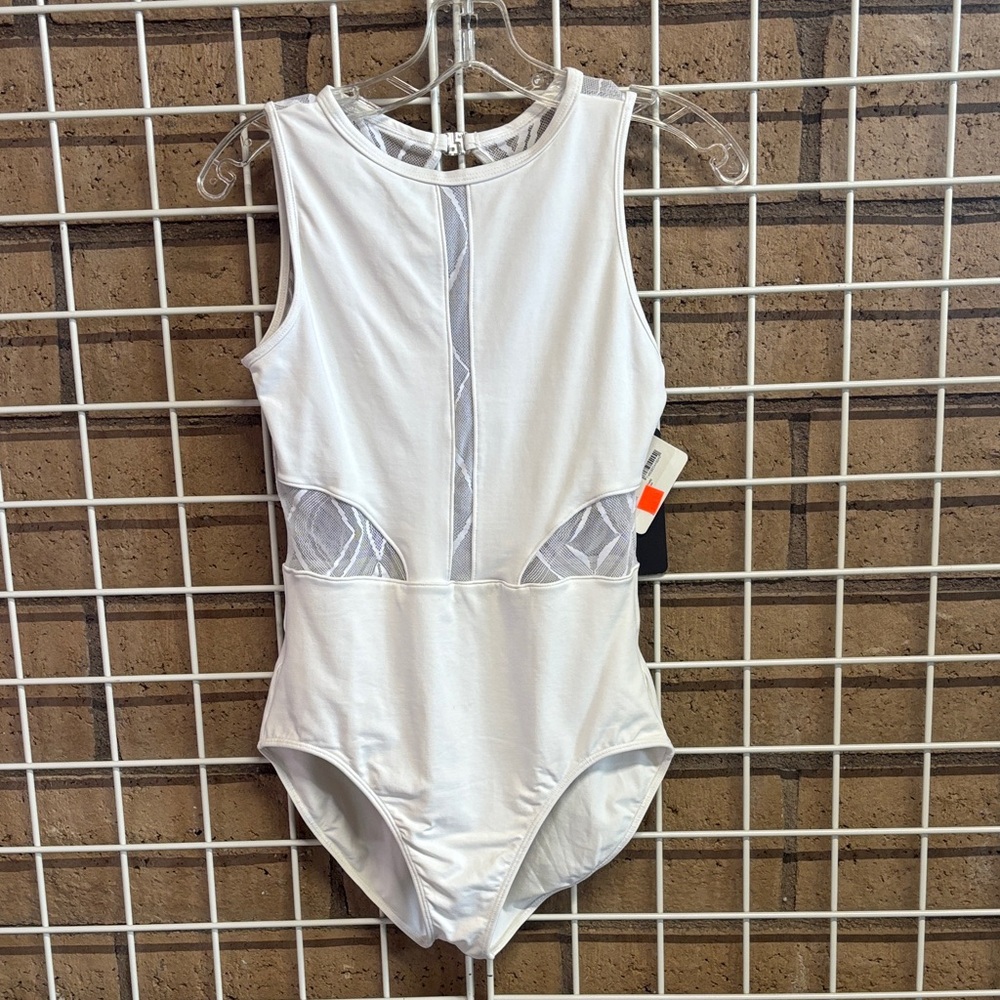 Sodanca- white leotard with lace mesh design. Has diamond cut out on back.